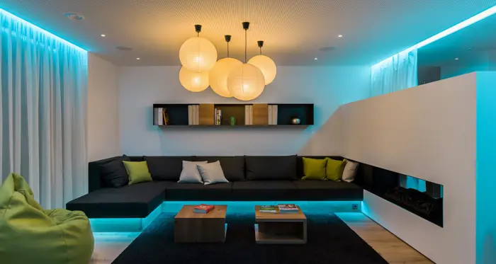 Living room with blue lighing and warm center lights